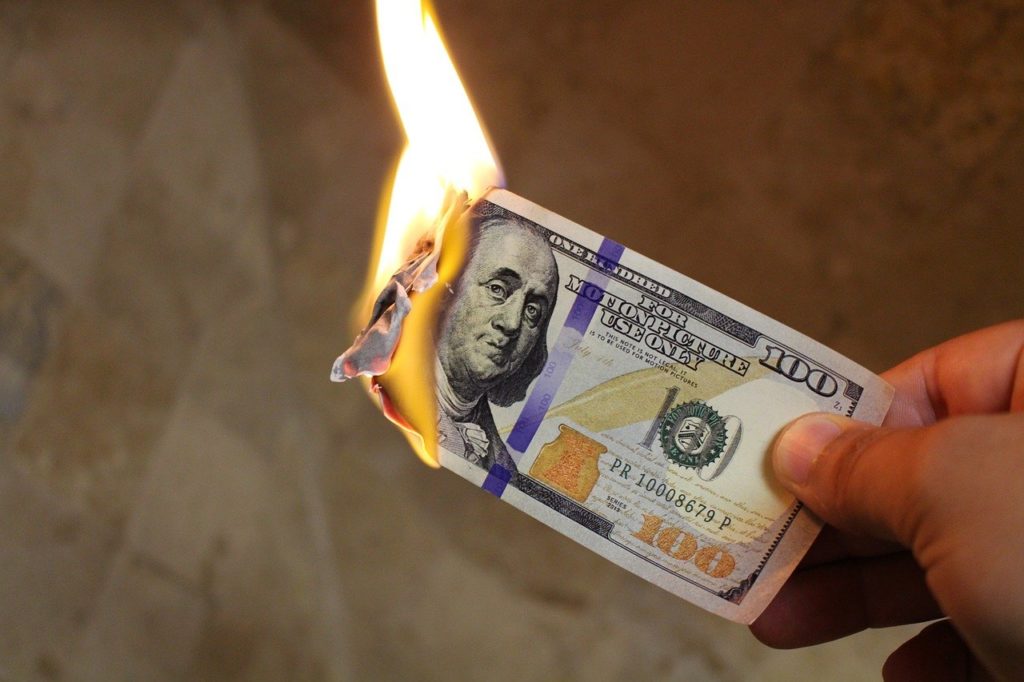 burning money, dollars, cash